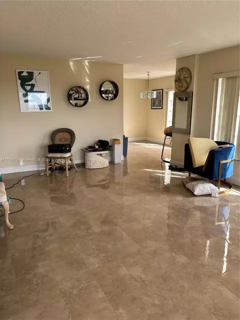 Living - 10777 W Sample Rd #714, Coral Springs, FL 33065 photo 7 of 9