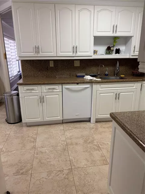 Kitchen - 10777 W Sample Rd #714, Coral Springs, FL 33065 photo 1 of 10