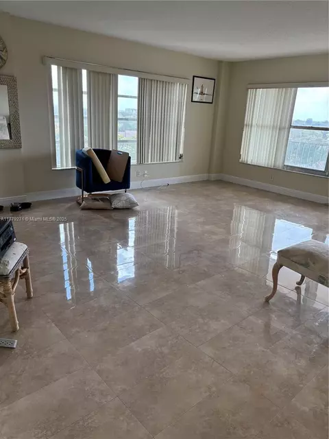 Living - 10777 W Sample Rd #714, Coral Springs, FL 33065 photo 5 of 9