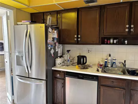 Kitchen - 10777 W Sample Rd #714, Coral Springs, FL 33065 photo 7 of 10