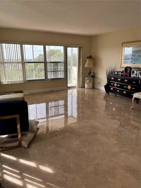 Living - 10777 W Sample Rd #714, Coral Springs, FL 33065 photo 9 of 9