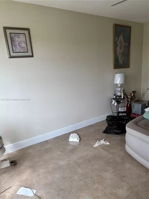 Living - 10777 W Sample Rd #714, Coral Springs, FL 33065 photo 6 of 9