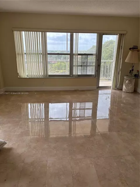 Living - 10777 W Sample Rd #714, Coral Springs, FL 33065 photo 8 of 9