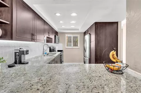 Kitchen - 891 W 79th Pl, Hialeah, FL 33014 photo 6 of 6