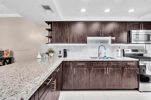 Kitchen - 891 W 79th Pl, Hialeah, FL 33014 photo 2 of 6