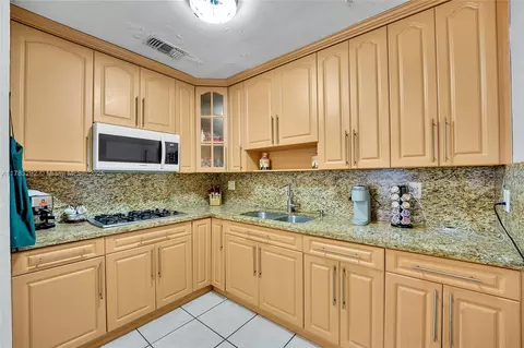 Kitchen - 220 E 61st St, Hialeah, FL 33013 photo 2 of 5