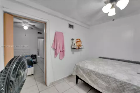 Bedroom - 220 E 61st St, Hialeah, FL 33013 photo 8 of 11