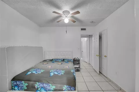 Bedroom - 220 E 61st St, Hialeah, FL 33013 photo 9 of 11