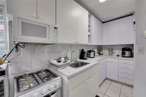 Kitchen - 220 E 61st St, Hialeah, FL 33013 photo 5 of 5