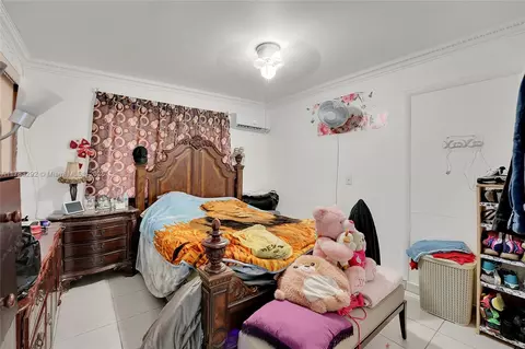Bedroom - 220 E 61st St, Hialeah, FL 33013 photo 5 of 11