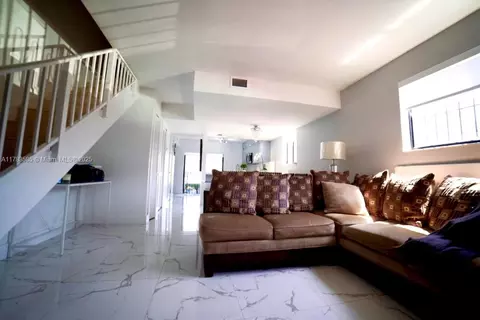 Living - 1380 W 41st St #101, Hialeah, FL 33012 photo 1 of 1