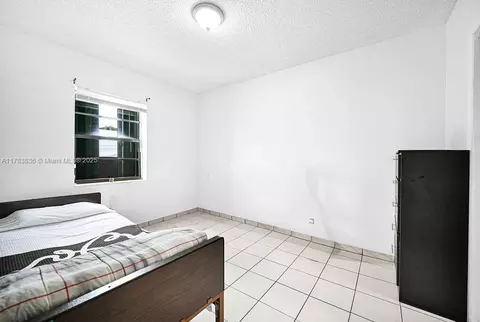 Bedroom - 5080 E 5th Ave, Hialeah, FL 33013 photo 6 of 10