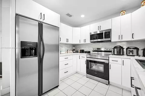 Kitchen - 5080 E 5th Ave, Hialeah, FL 33013 photo 3 of 3