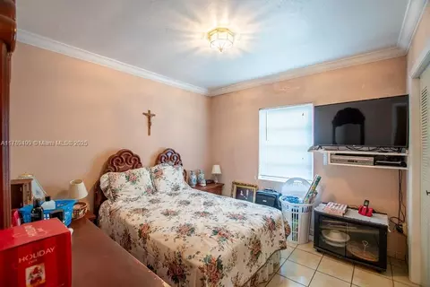 Bedroom - 891 E 24th St, Hialeah, FL 33013 photo 7 of 11