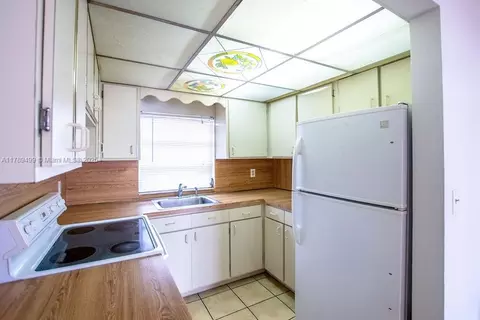 Kitchen - 891 E 24th St, Hialeah, FL 33013 photo 5 of 5