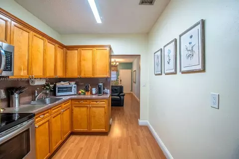 Kitchen - 891 E 24th St, Hialeah, FL 33013 photo 2 of 5