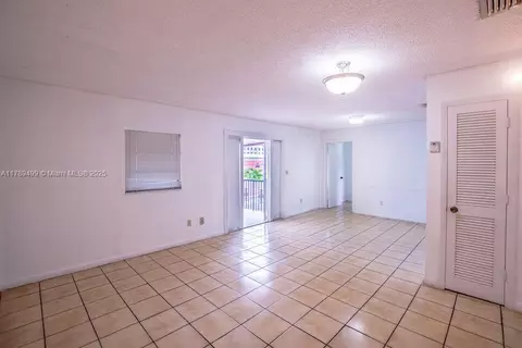Living - 891 E 24th St, Hialeah, FL 33013 photo 5 of 5