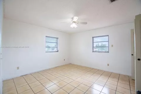 Bedroom - 891 E 24th St, Hialeah, FL 33013 photo 10 of 11