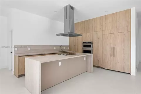 Kitchen - 19601 E Saint Andrews Dr, Hialeah, FL 33015 photo 2 of 3