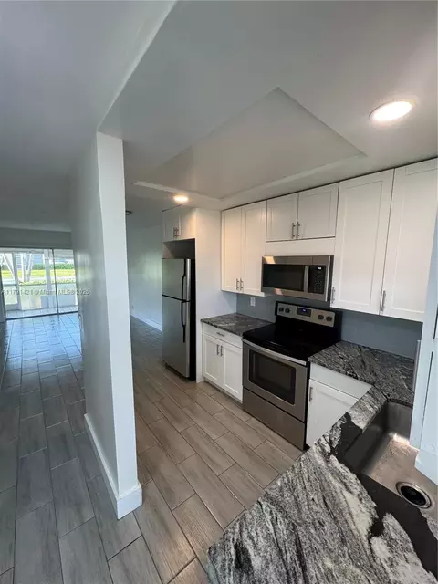 9851 Sandalfoot Blvd #208, Boca Raton, FL 33428