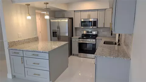 Kitchen - 7184 W 3rd Ave, Hialeah, FL 33014 photo 1 of 1
