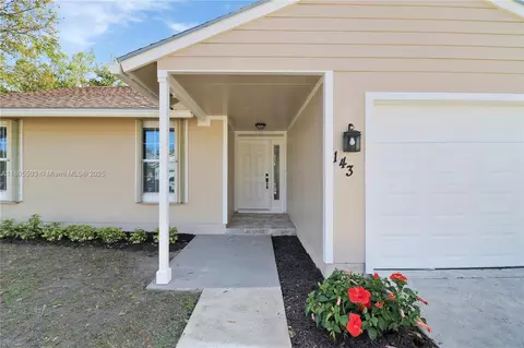 143 Greentree Cir, Jupiter, FL 33458