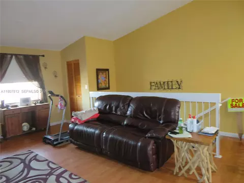 Living - 10017 W Okeechobee Rd #202, Hialeah Gardens, FL 33016 photo 2 of 2