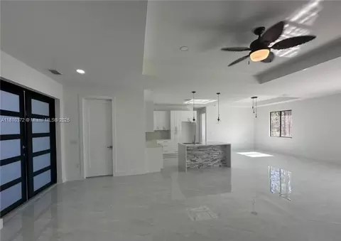 Living - 2002 E 13th St, Lehigh Acres, FL 33972 photo 1 of 6