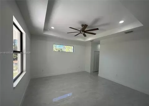 Living - 2002 E 13th St, Lehigh Acres, FL 33972 photo 5 of 6