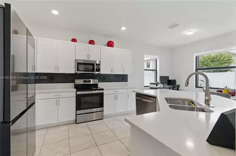 Kitchen - 3534 W 106th St, Hialeah, FL 33018 photo 2 of 2