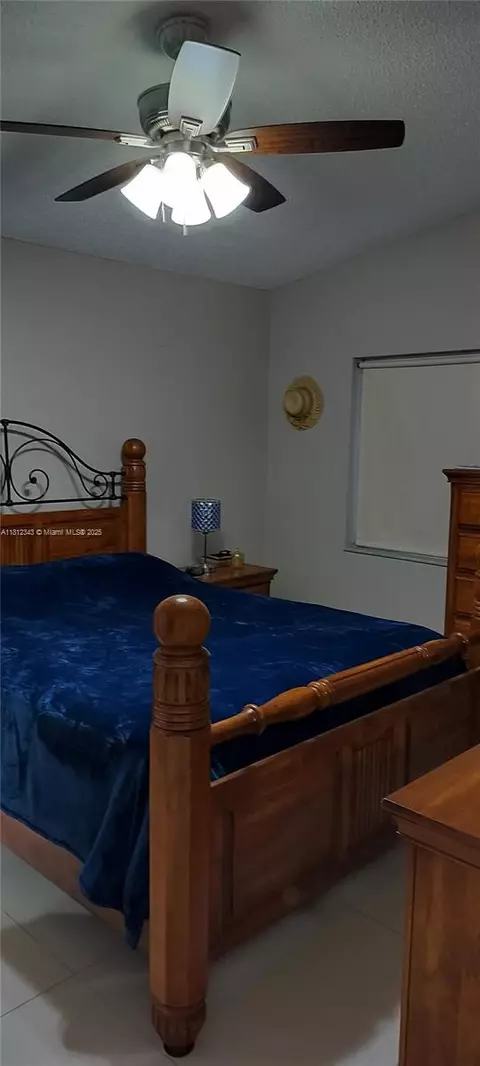 Bedroom - 3149 W 68th Pl, Hialeah, FL 33018 photo 5 of 10