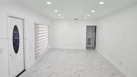 Living - 130 W 60th St, Hialeah, FL 33012 photo 2 of 4