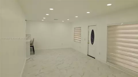 Living - 130 W 60th St, Hialeah, FL 33012 photo 3 of 4