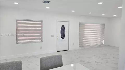 Living - 130 W 60th St, Hialeah, FL 33012 photo 1 of 4