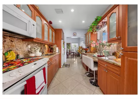 Kitchen - 611 E 48th St, Hialeah, FL 33013 photo 1 of 2