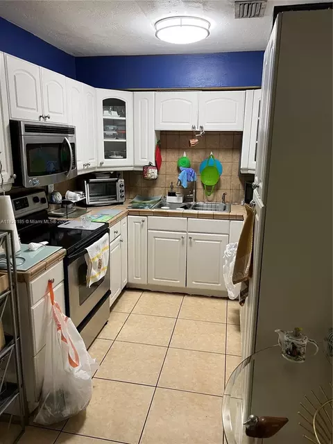 Kitchen - 509 W 16 St, Hialeah, FL 33010 photo 1 of 2