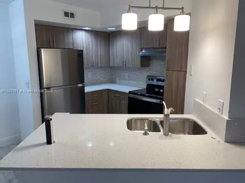 12950 Vista Isles Dr #414, Sunrise, FL 33325