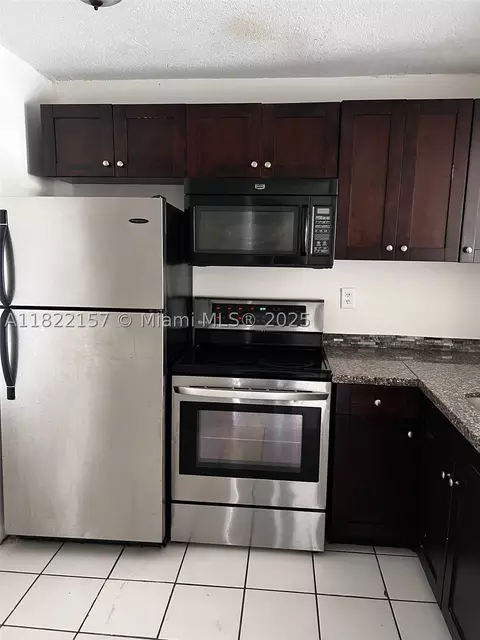 498 NW 165th St Rd #D303, Miami, FL 33169