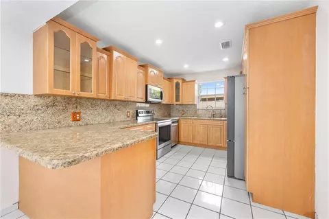 Kitchen - 30 E 52nd Pl, Hialeah, FL 33013 photo 1 of 3