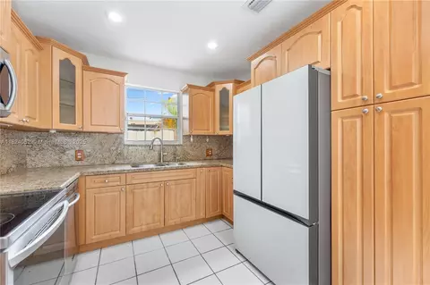 Kitchen - 30 E 52nd Pl, Hialeah, FL 33013 photo 2 of 3