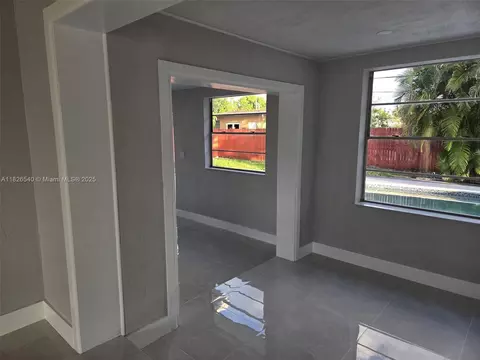 Living - 954 W 72nd Pl, Hialeah, FL 33014 photo 4 of 5