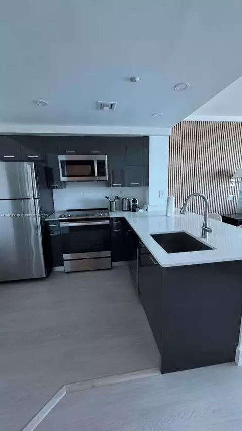 Kitchen - 2889 Mcfarlane Rd #1908, Miami, FL 33133 photo 2 of 2