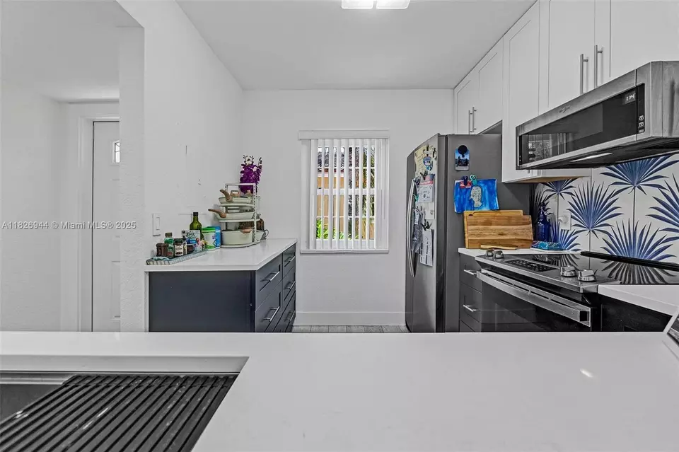 Kitchen - 1105 Lake Shore Dr #202, Lake Park, FL 33403 photo 3 of 3