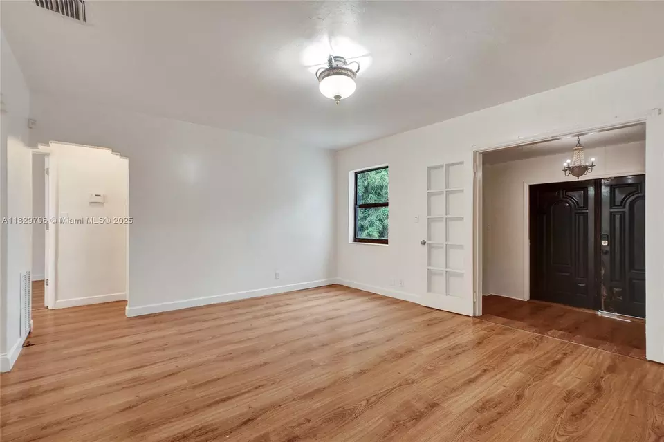 Living - 871 NE 122nd St, North Miami, FL 33161 photo 6 of 17