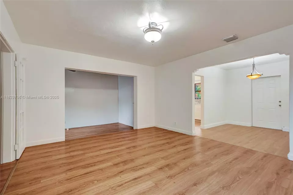Living - 871 NE 122nd St, North Miami, FL 33161 photo 7 of 17