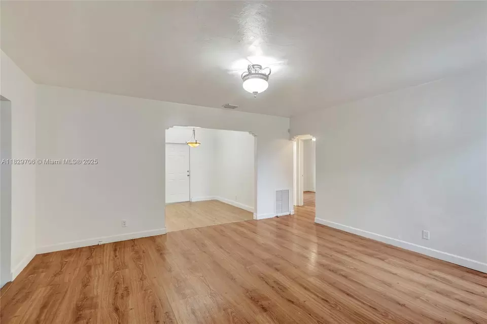Living - 871 NE 122nd St, North Miami, FL 33161 photo 4 of 17