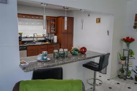 Kitchen - 961 W 53rd St, Hialeah, FL 33012 photo 4 of 5