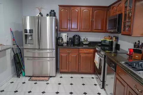 Kitchen - 961 W 53rd St, Hialeah, FL 33012 photo 3 of 5