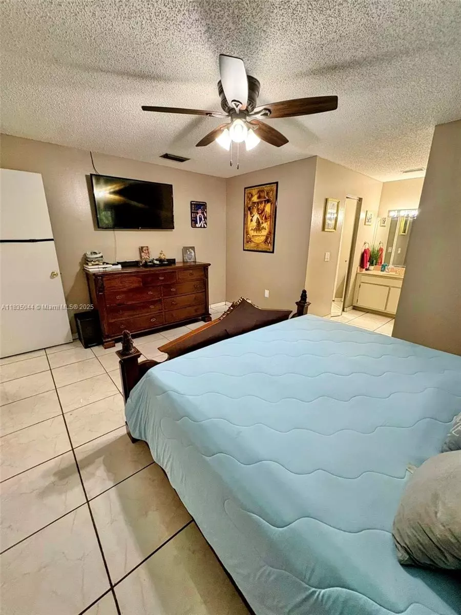 Bedroom - 11920 SW 132nd Ave, Miami, FL 33186 photo 9 of 14