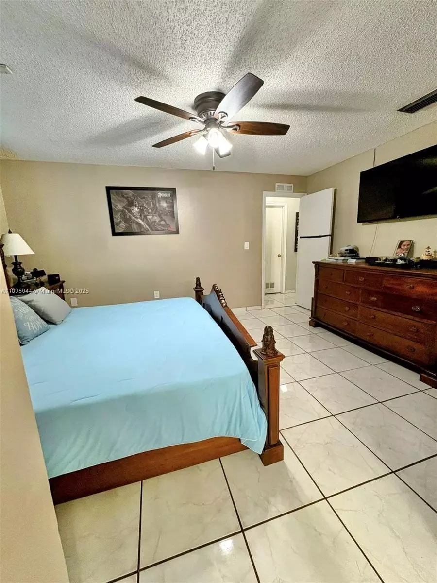 Bedroom - 11920 SW 132nd Ave, Miami, FL 33186 photo 8 of 14